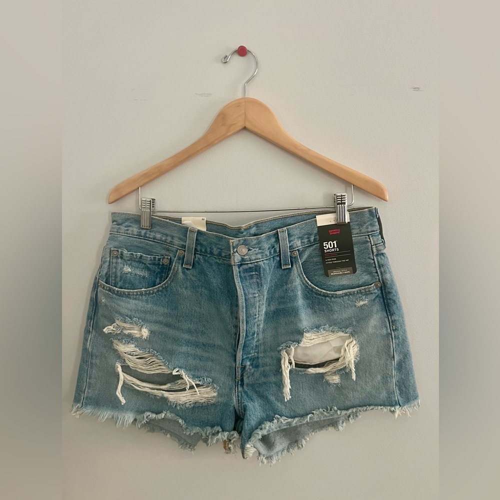 Brand new with tags - Levi’s 501 distress denim shorts.